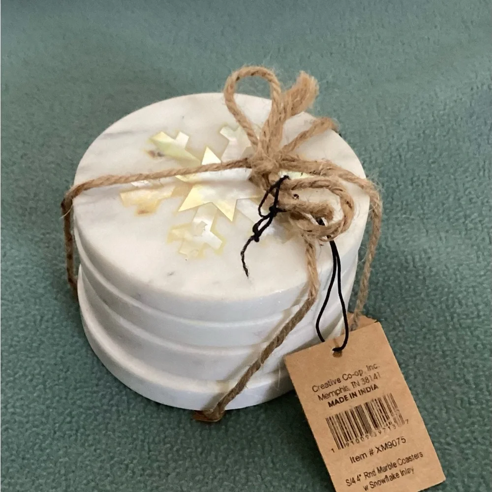 White Marble Coasters with Snowflake Design